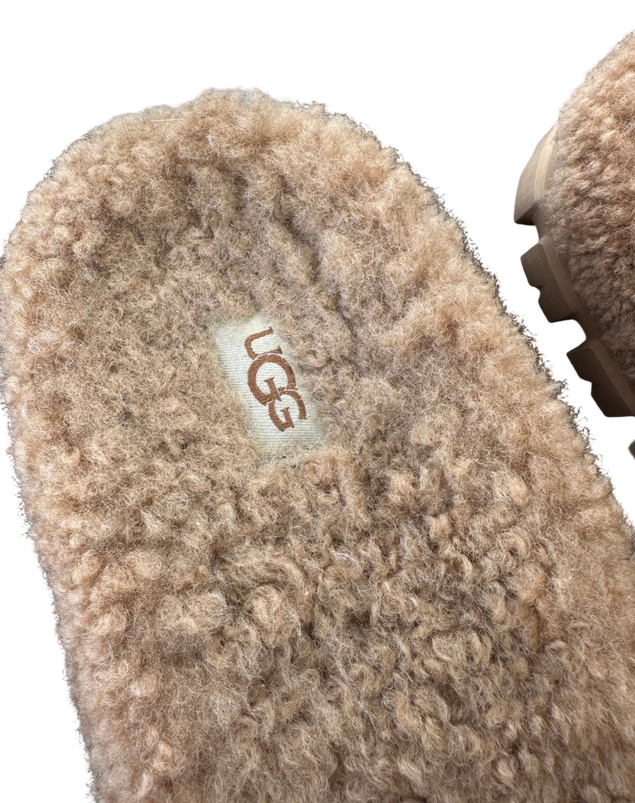 UGG
Cozetta Curly Slides in Sheepskin